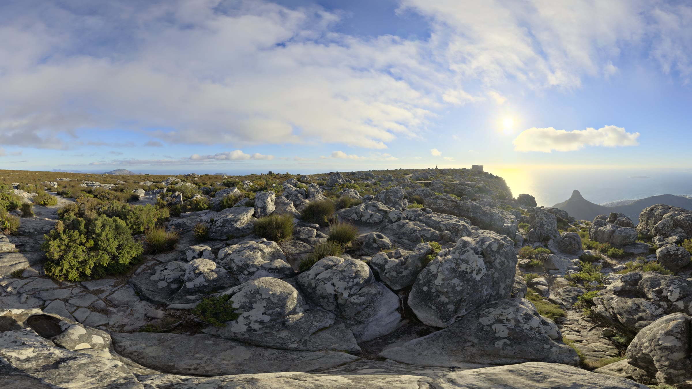 360° panorama of a hilltop watchtower above a valley